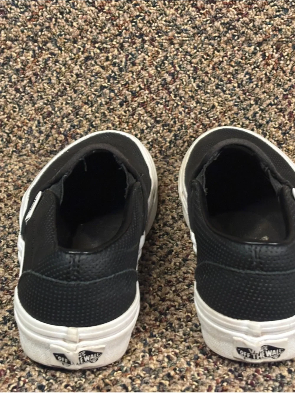 Vans Black Perforated Slip-On Sneakers with White Sole